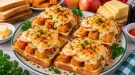 Überbackene Fischtoasts mit Fischstäbchen, Apfel und Käse.