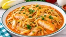 Fischfilet mit Chicorée in cremiger roter Paprikatunke.