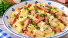 Cremiger Sellerietopf mit Kartoffeln, Sellerie, Leberkäsestreifen und Petersilie.